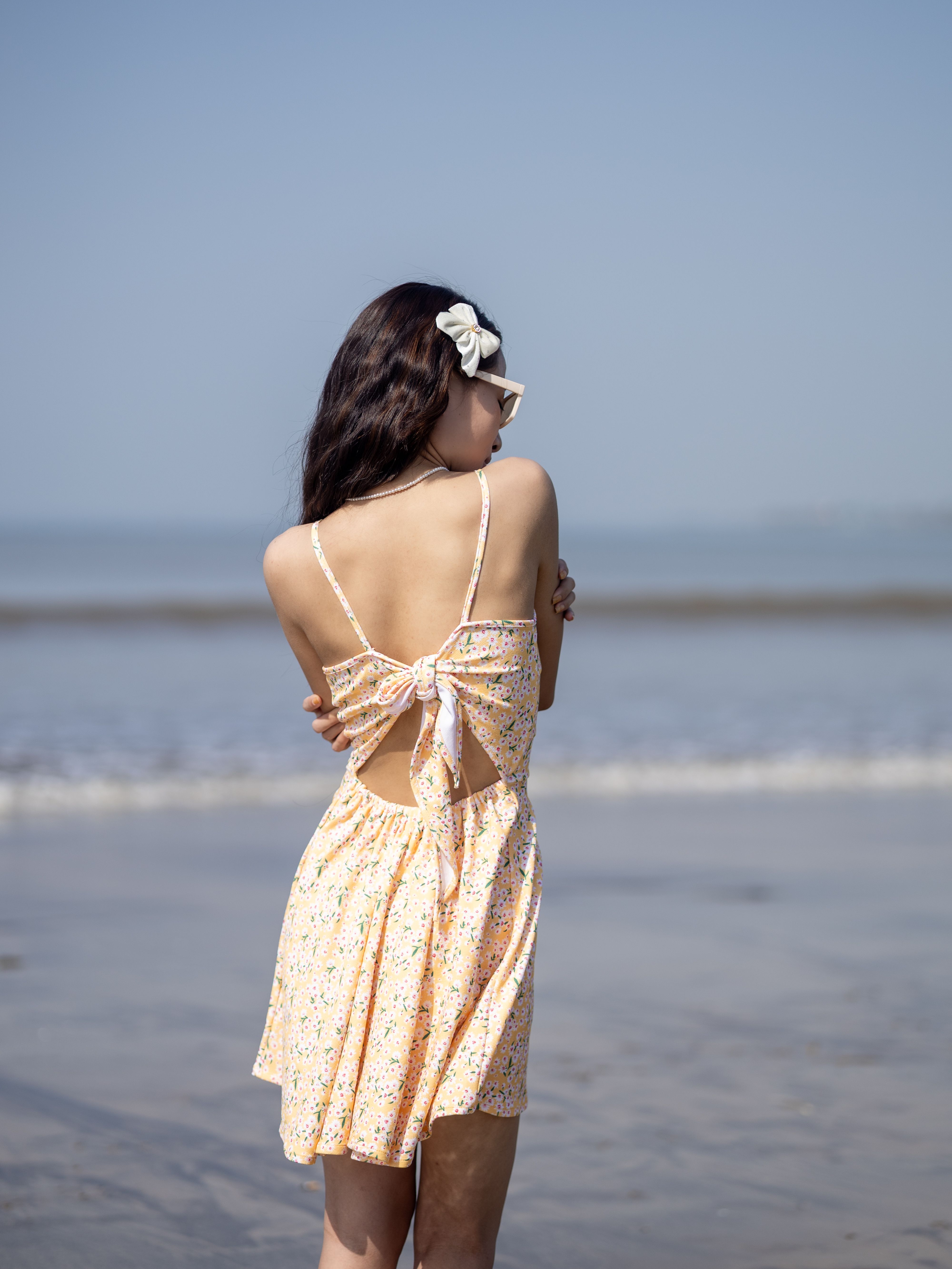 Woman in Summer Dress at the Beach · Free Stock Photo
