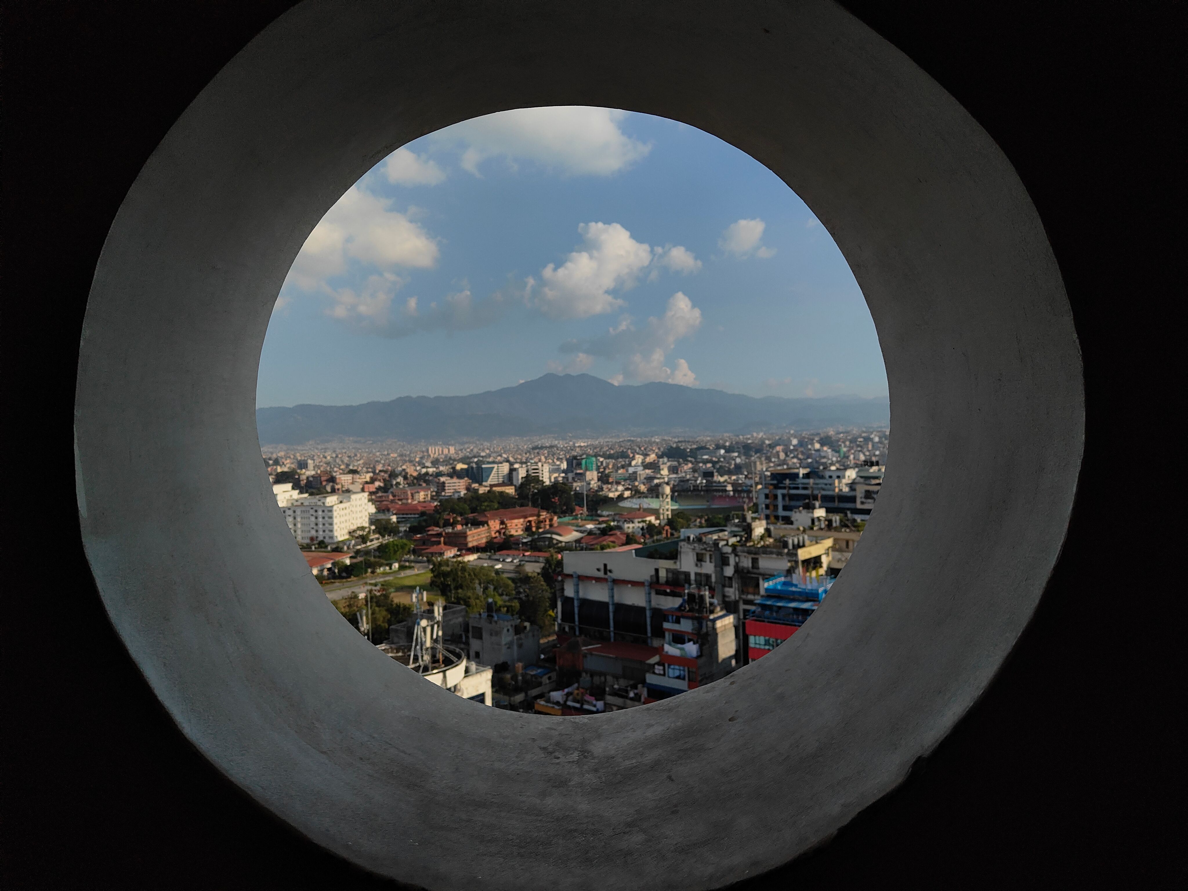 Circular View of Cityscape with Mountains · Free Stock Photo