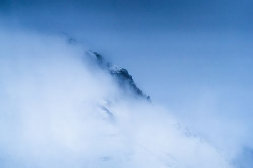 Free A dramatic misty mountain peak shrouded in fog in Santa Cruz, Patagonia. Stock Photo