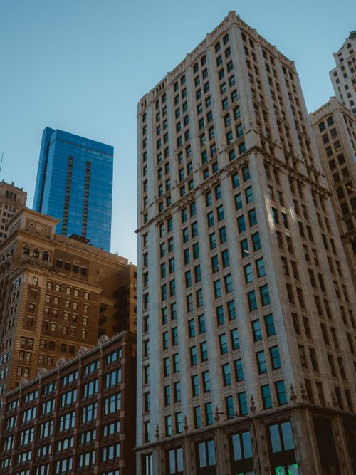 Free View of diverse skyscrapers under a clear sky, showcasing modern architecture. Stock Photo