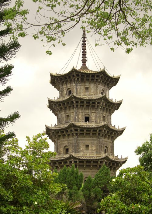 Free A scenic view of the historic pagoda surrounded by lush greenery in Quanzhou, Fujian. Stock Photo