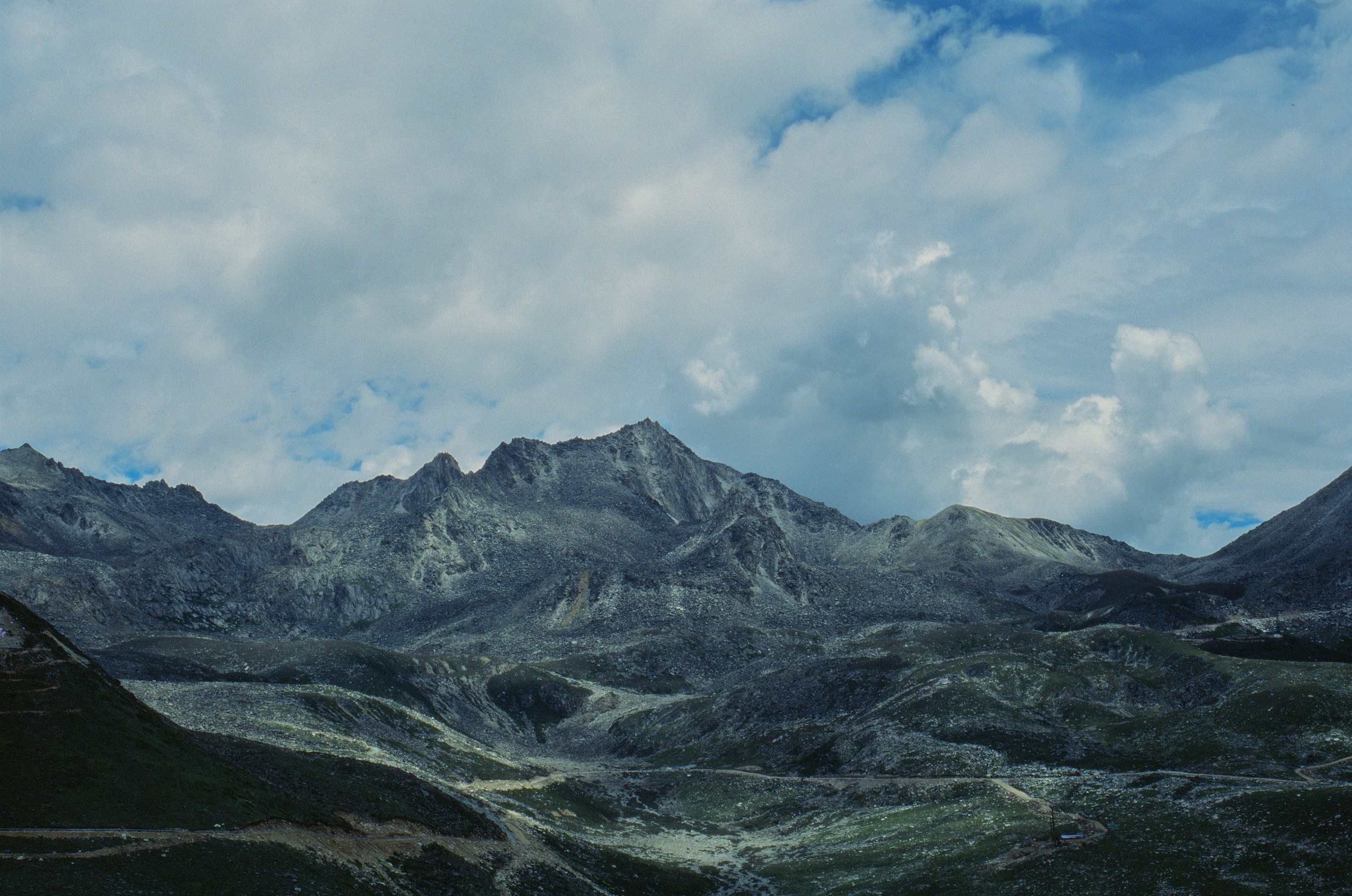 Majestic Mountain Range under Dramatic Sky · Free Stock Photo