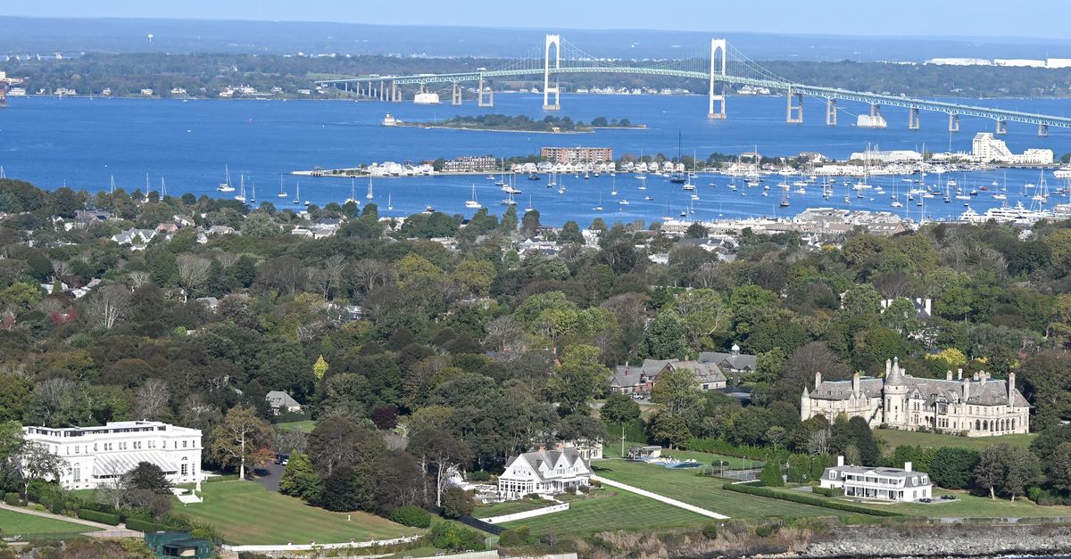 Stunning aerial photograph showcasing Newport's coastline and historic mansions.