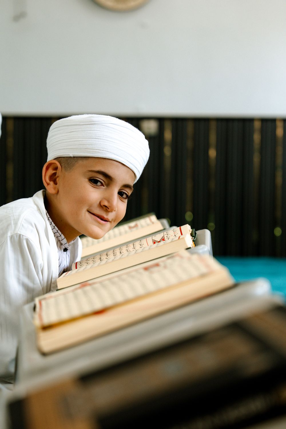An IlmBeacon student reciting from the mushaf during his lesson
