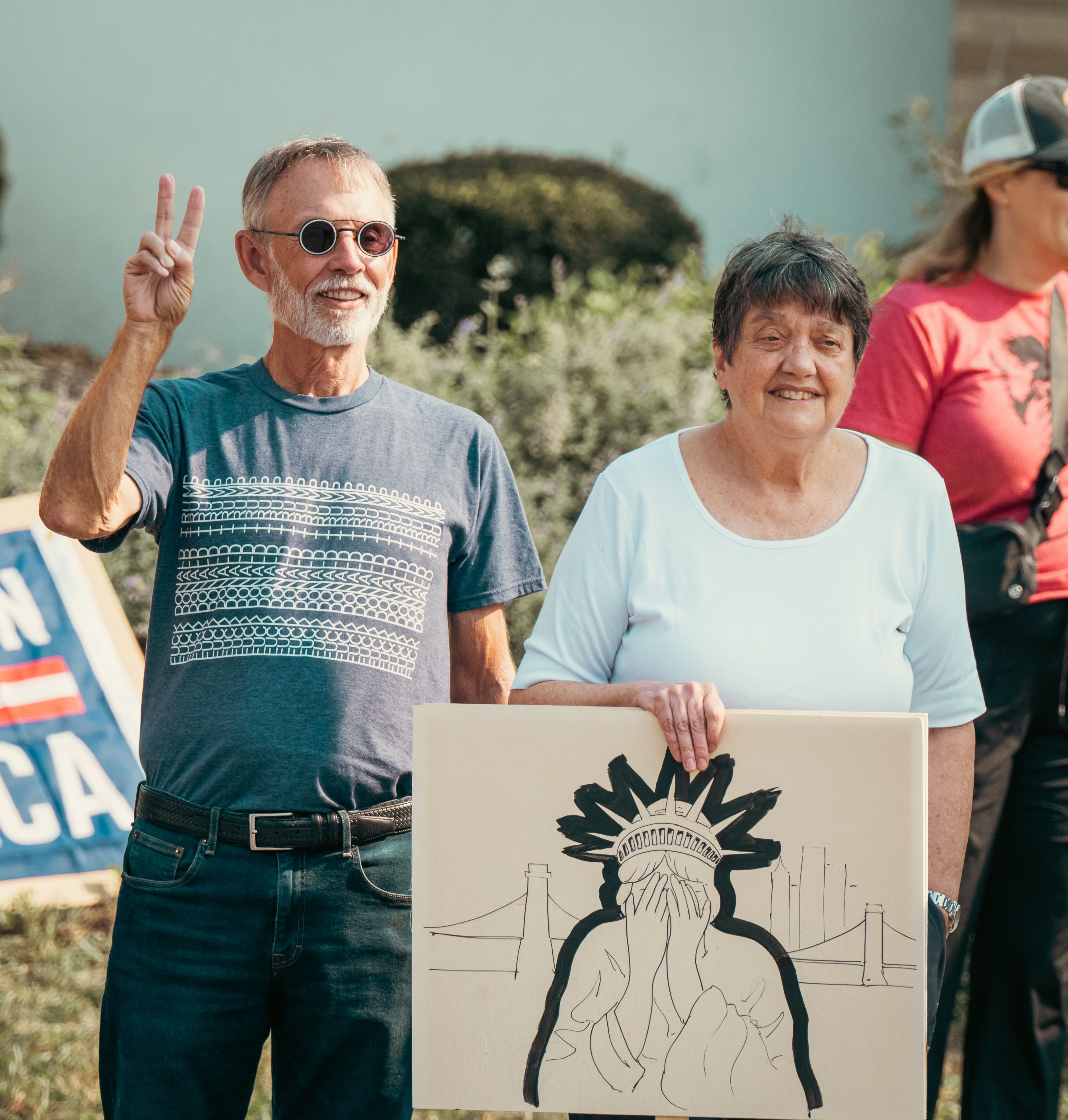 People at Outdoor Protest Holding Artwork · Free Stock Photo