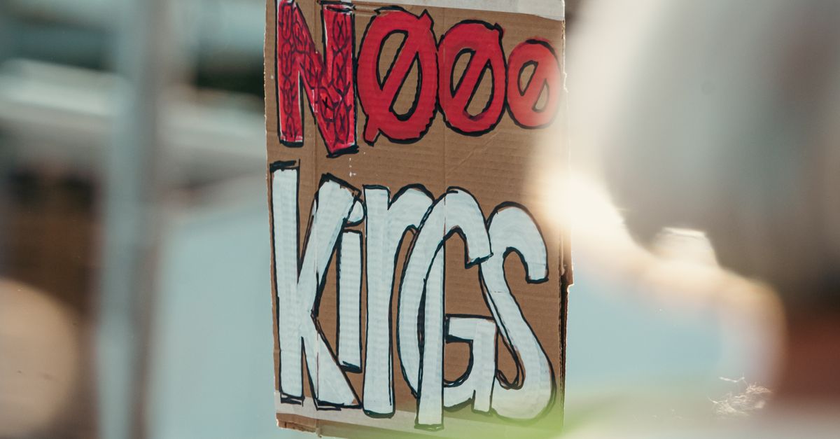 Protest Sign Lettering Protest Sign with Bold Red Lettering in Focus · Free Stock Photo