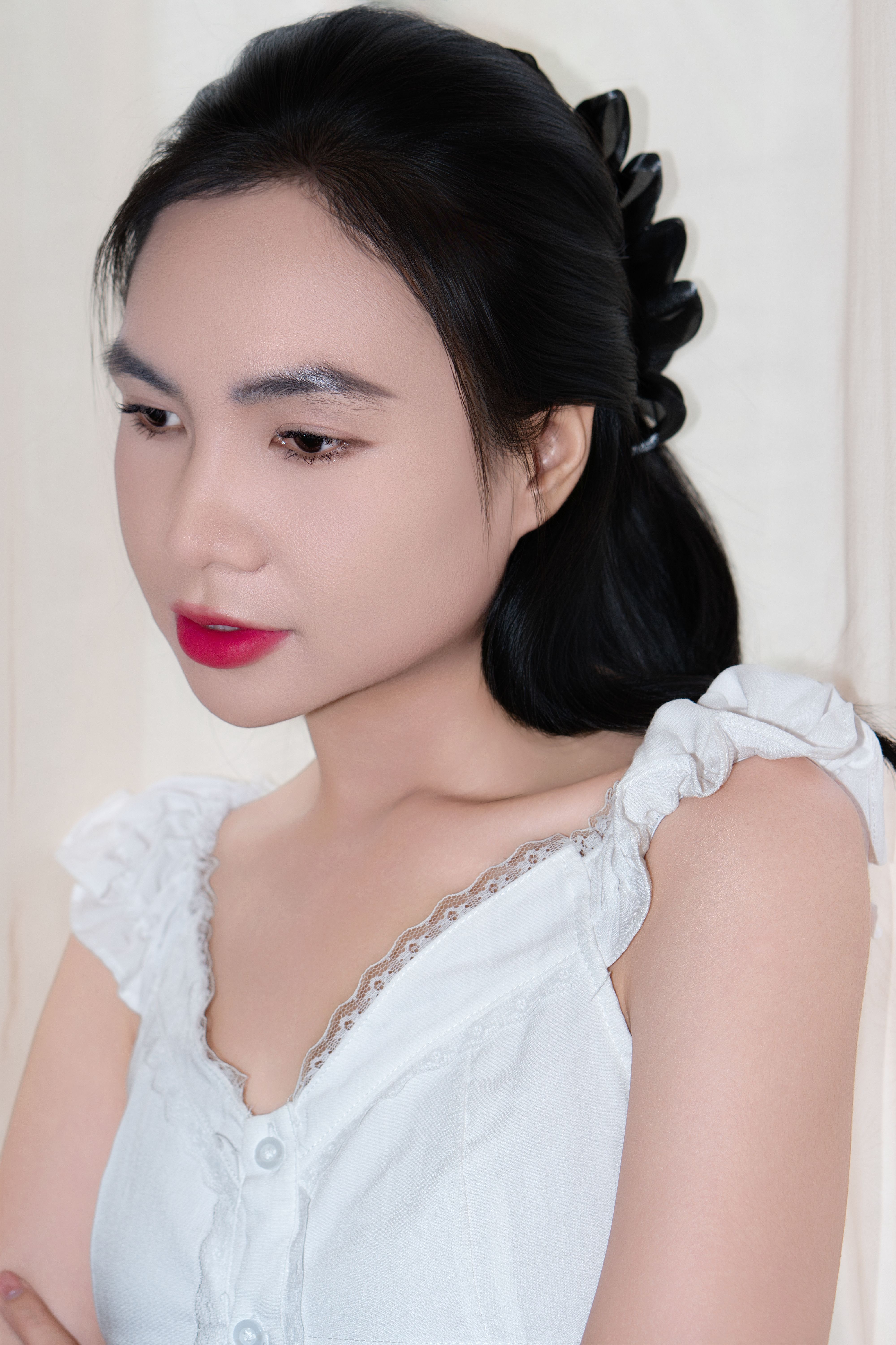 Elegant Portrait of Young Woman in White Dress · Free Stock Photo