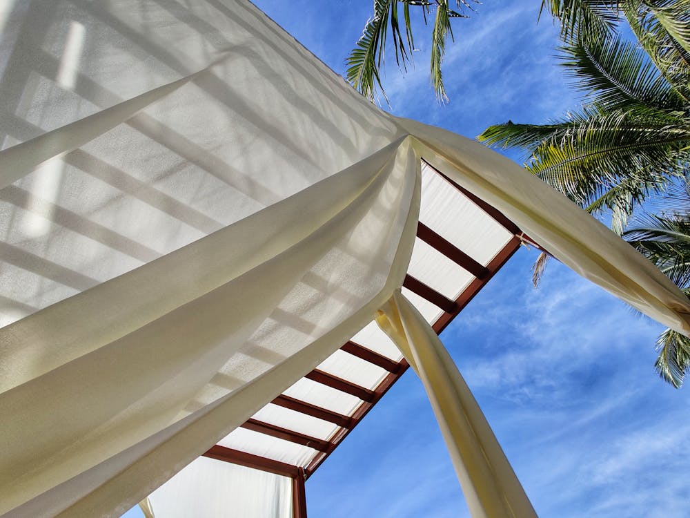 Stylish wooden resort pavilion on sunny day