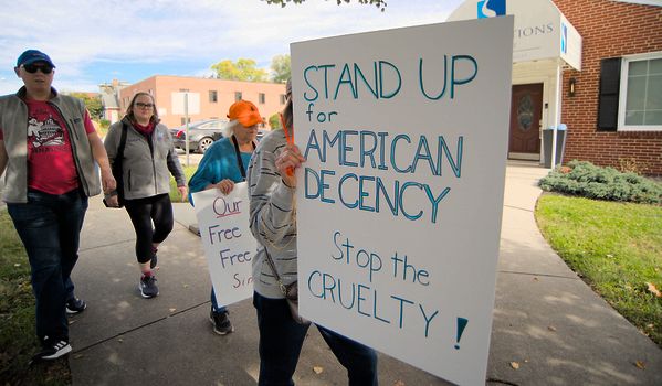 A peaceful protest in Towson, Maryland advocating for American decency and against cruelty.