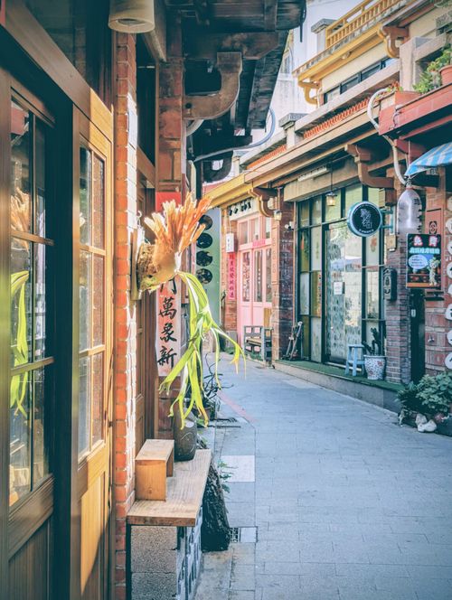 Free Explore a quaint traditional street in Penghu County, Taiwan, showcasing vibrant shops and local architecture. Stock Photo