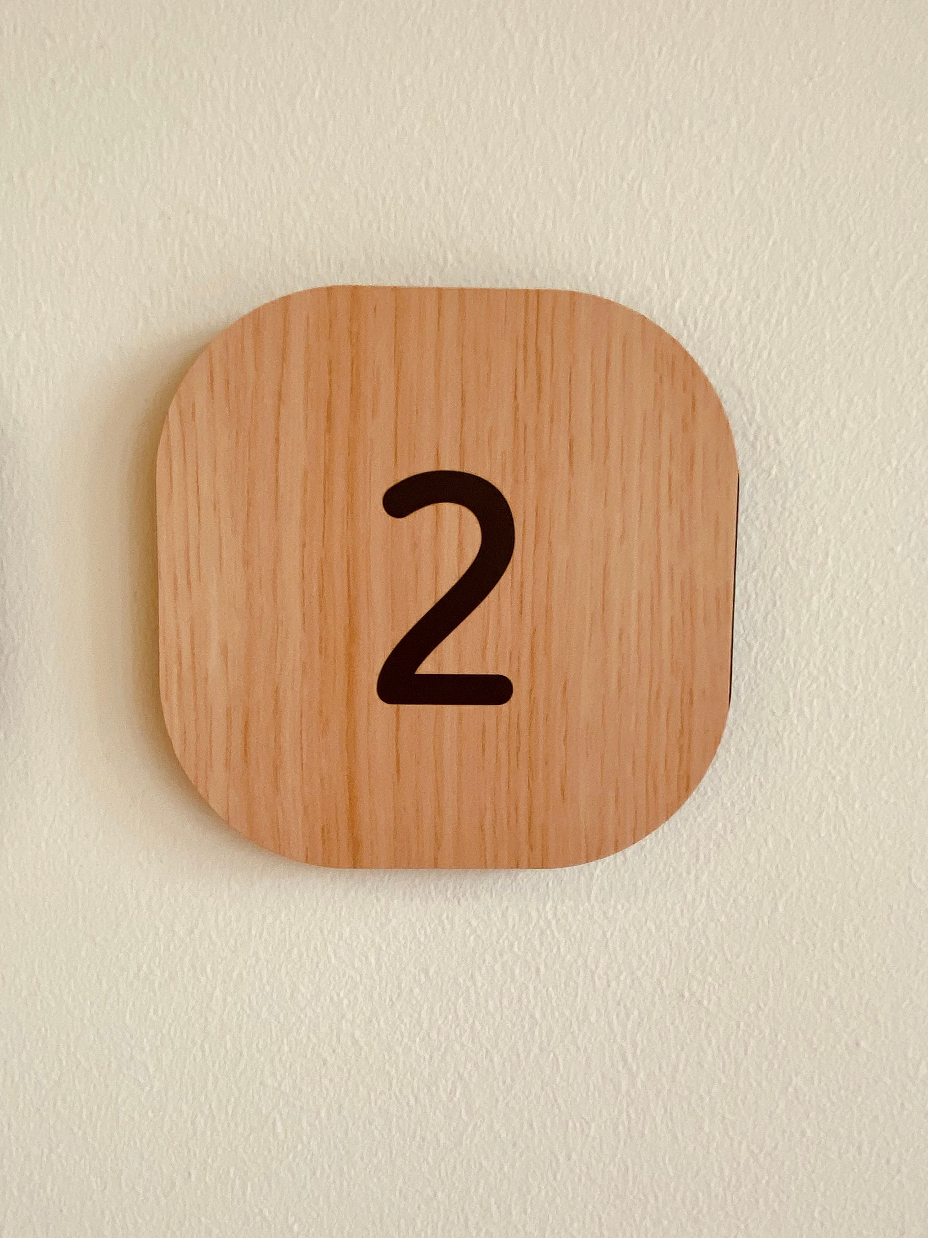 Minimalist Wooden Number Two Wall Decor · Free Stock Photo