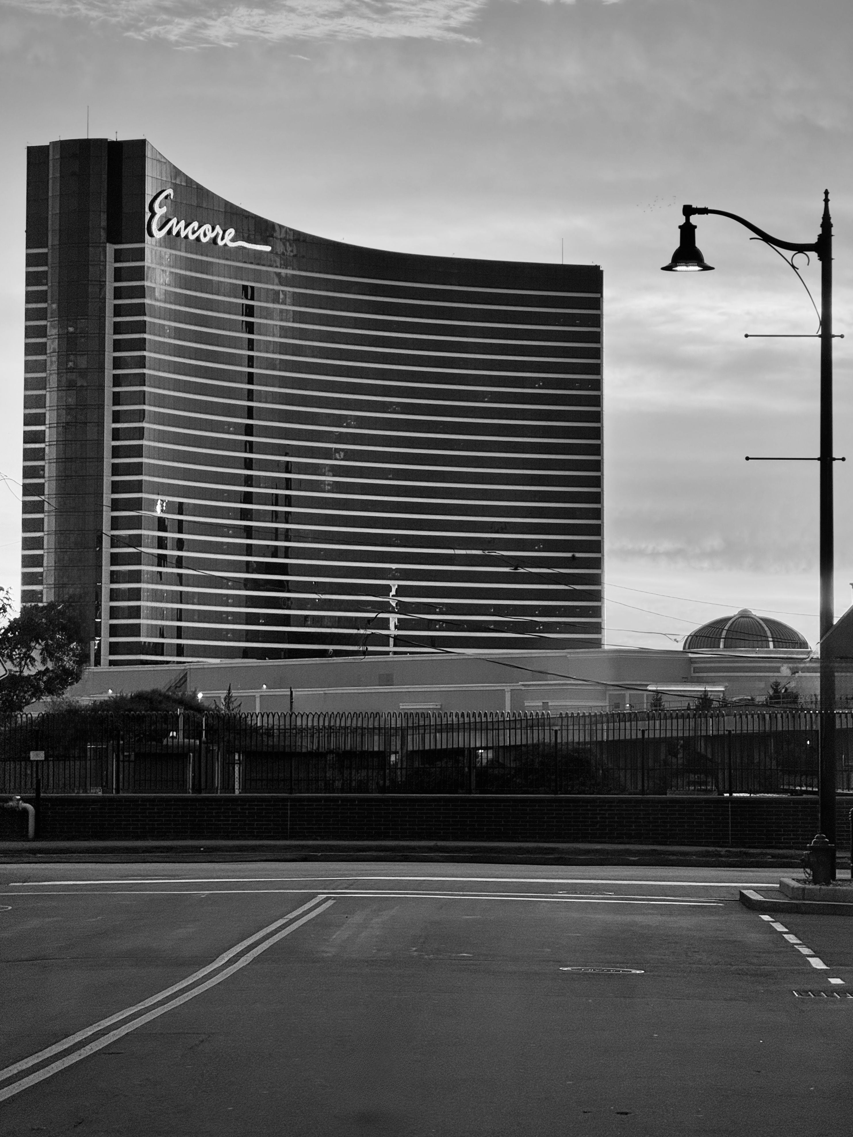 Encore Hotel Building in Black and White · Free Stock Photo