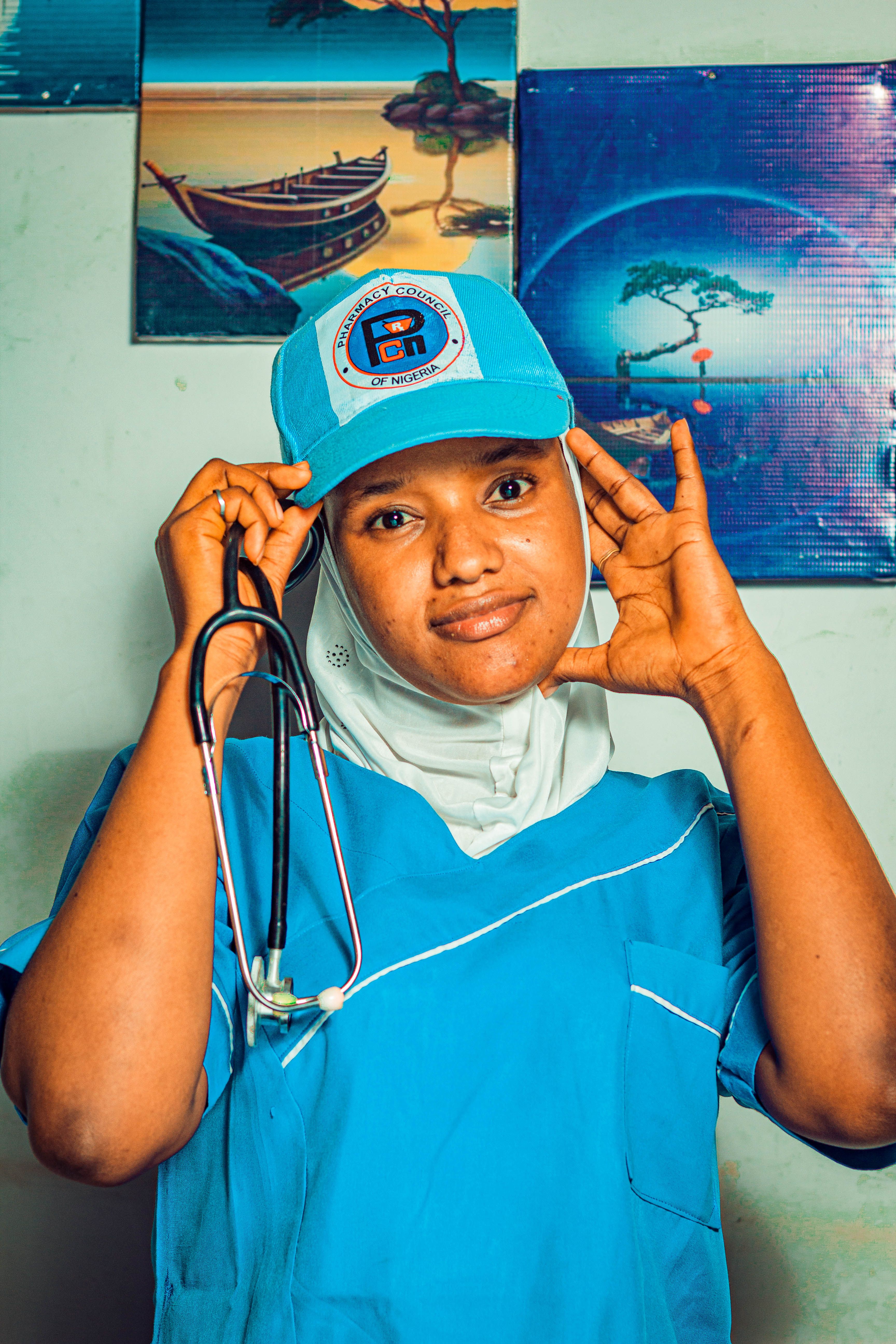Smiling nurse in clinical attire representing a welcoming patient experience