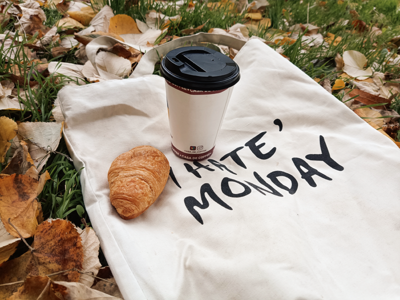 Takeaway coffee and pastry from Grounded Coffee Co. in Melbourne