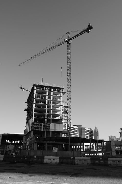 Black and White Urban Construction Site with Crane · Free Stock Photo
