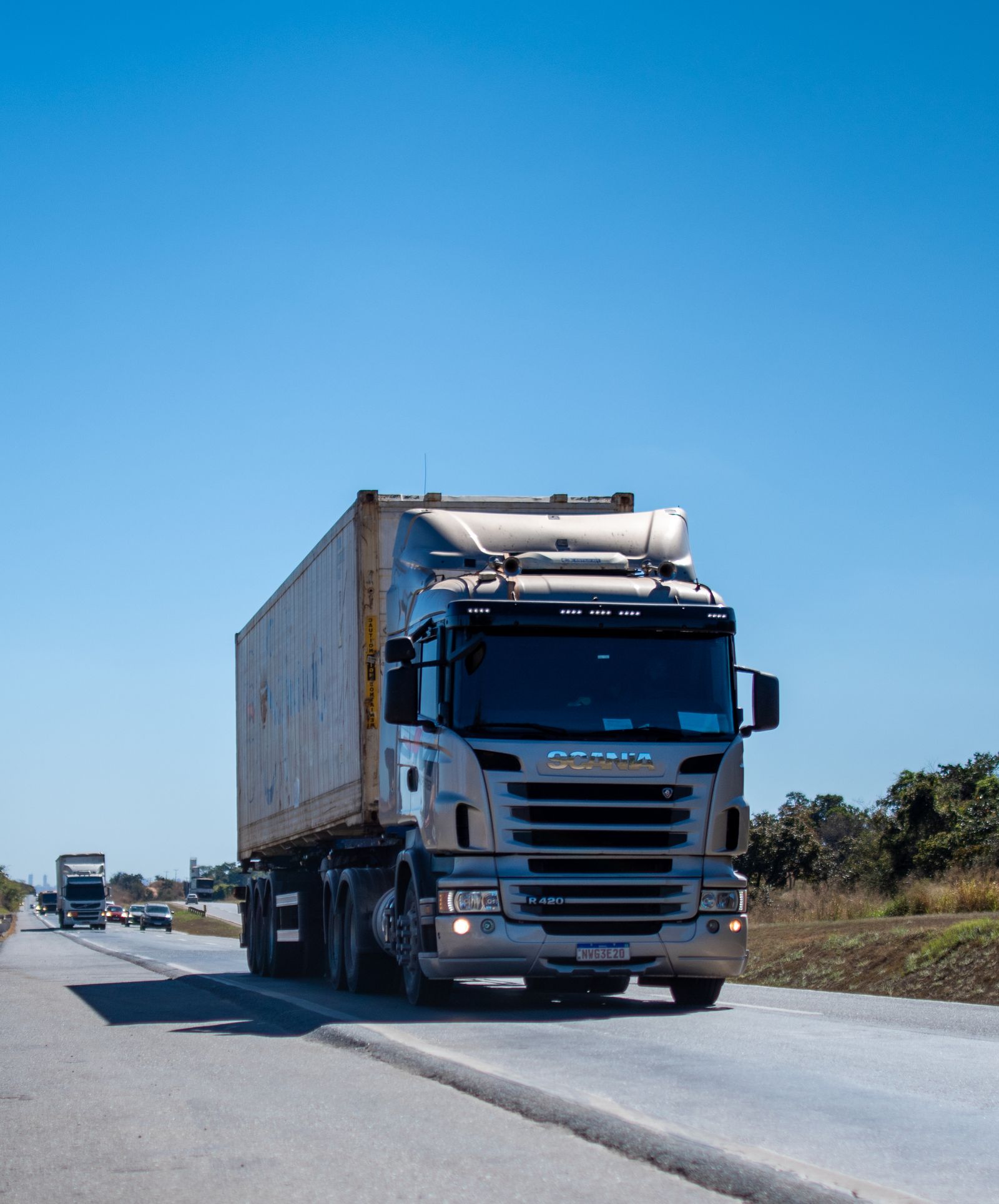 Freight truck on a clear highway under blue sky