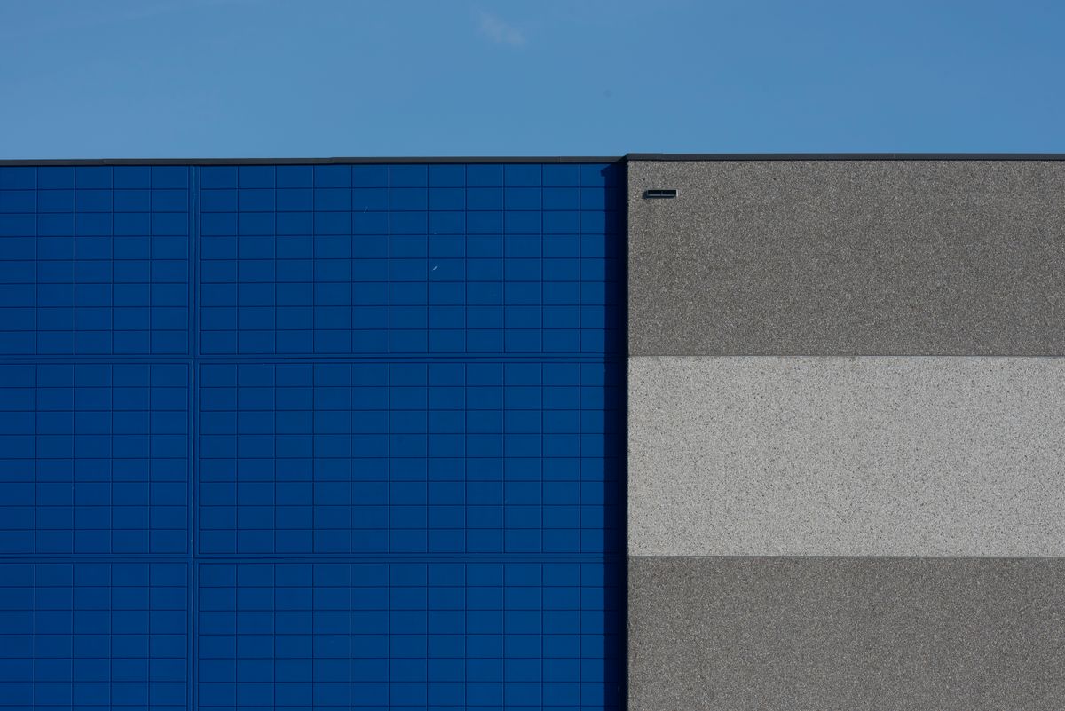 Modern Industrial Building with Blue Facade · Free Stock Photo