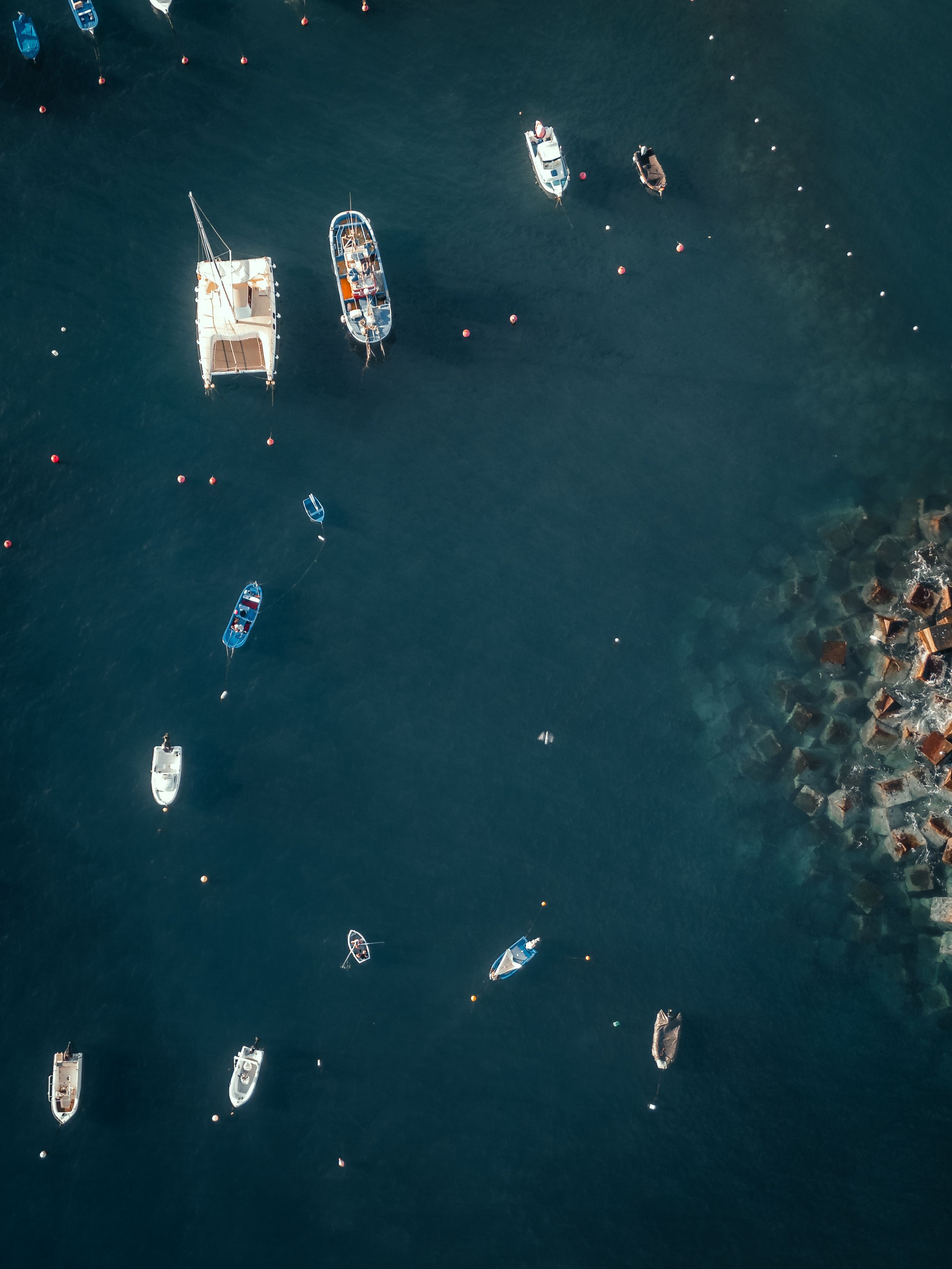 Birds Eye View of Lighthouse on Sea Coast · Free Stock Photo