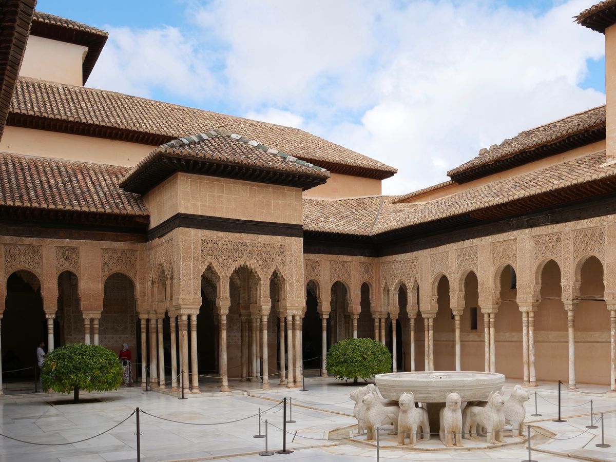 The Alhambra's water-filled courtyards — an acoustic architecture of fountains that photography cannot include.
