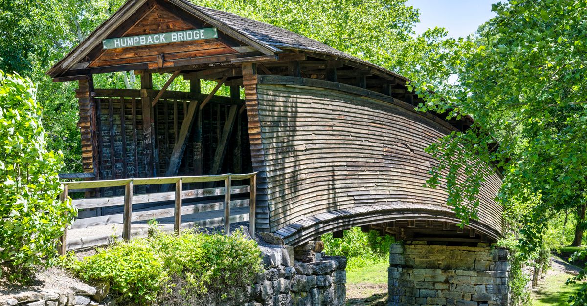 Explore the charming Humpback Bridge, a unique covered bridge in Lexington, Virginia.