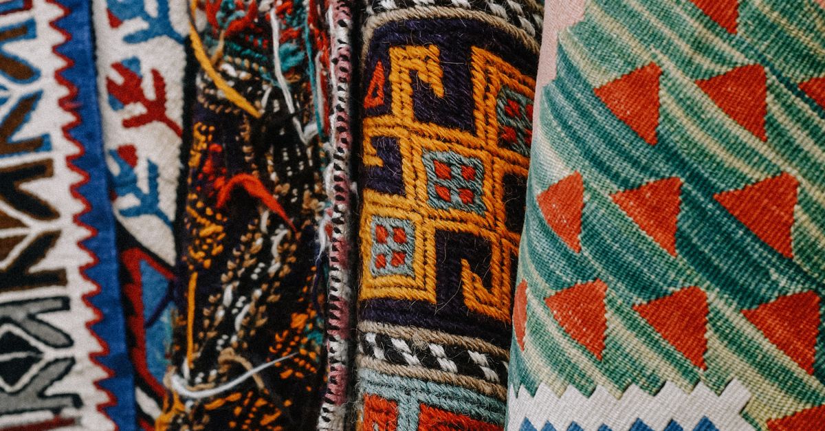 Ethic Rug Vibrant Ethnic Patterned Rugs Displayed Indoors · Free Stock Photo
