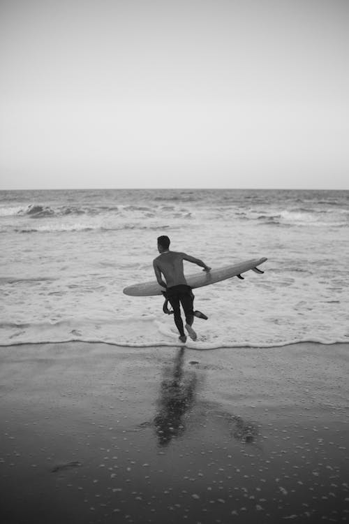 A Surf rider Enjoying His Vacation 