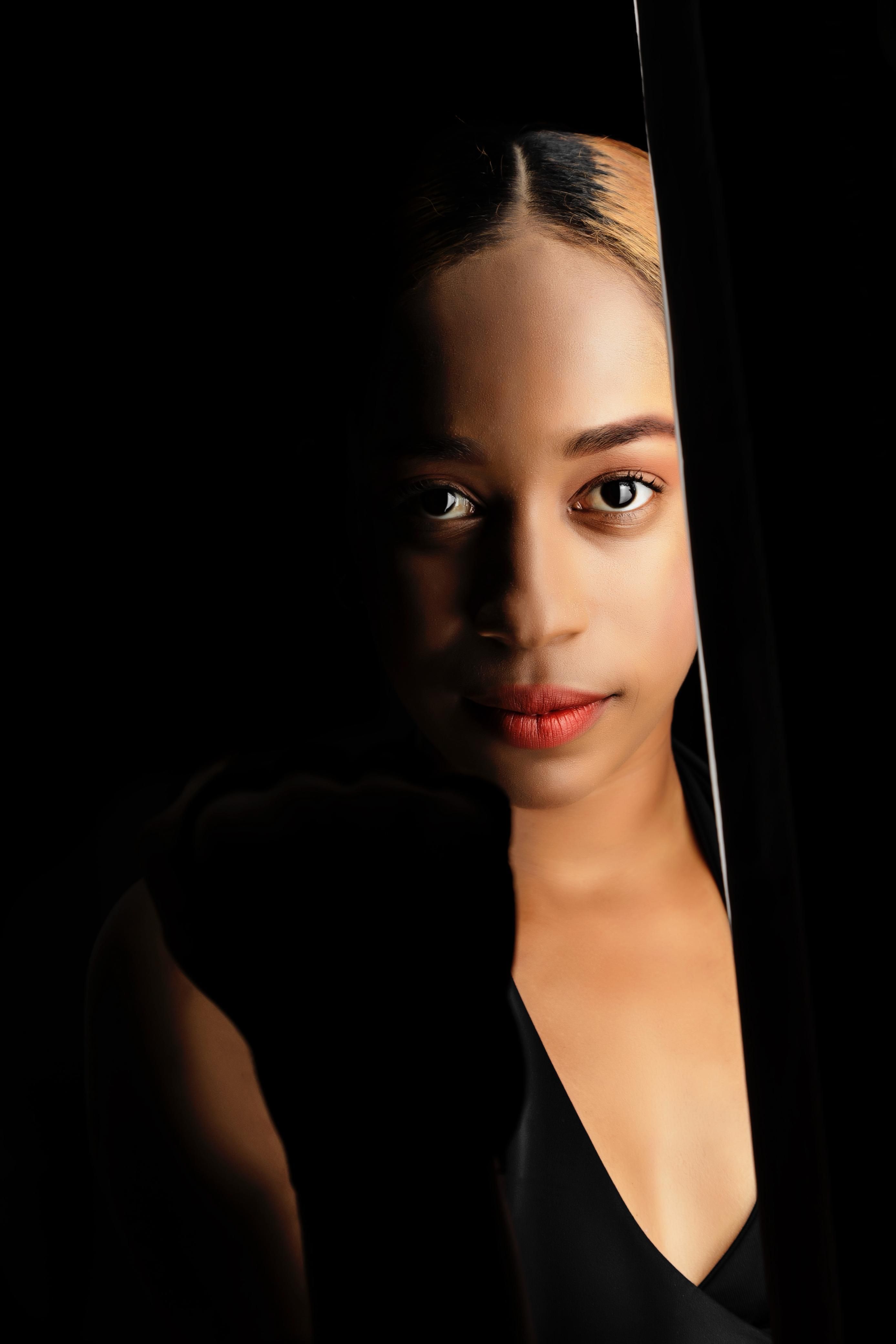 Portrait of a Woman with Dramatic Lighting · Free Stock Photo