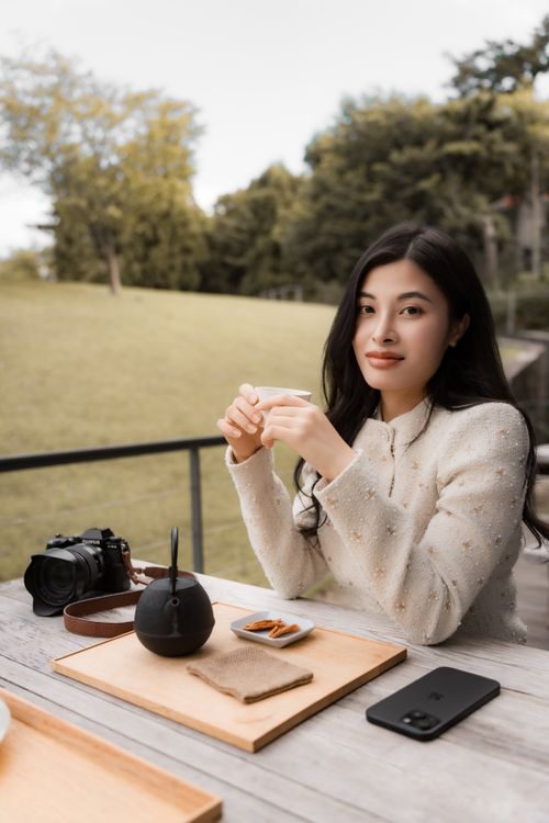 Serene Outdoor Tea Time with Camera Setup · Free Stock Photo