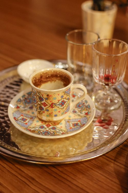 Free Close-up of an ornate Turkish coffee set on a tray. Perfect for culturally-themed imagery. Stock Photo