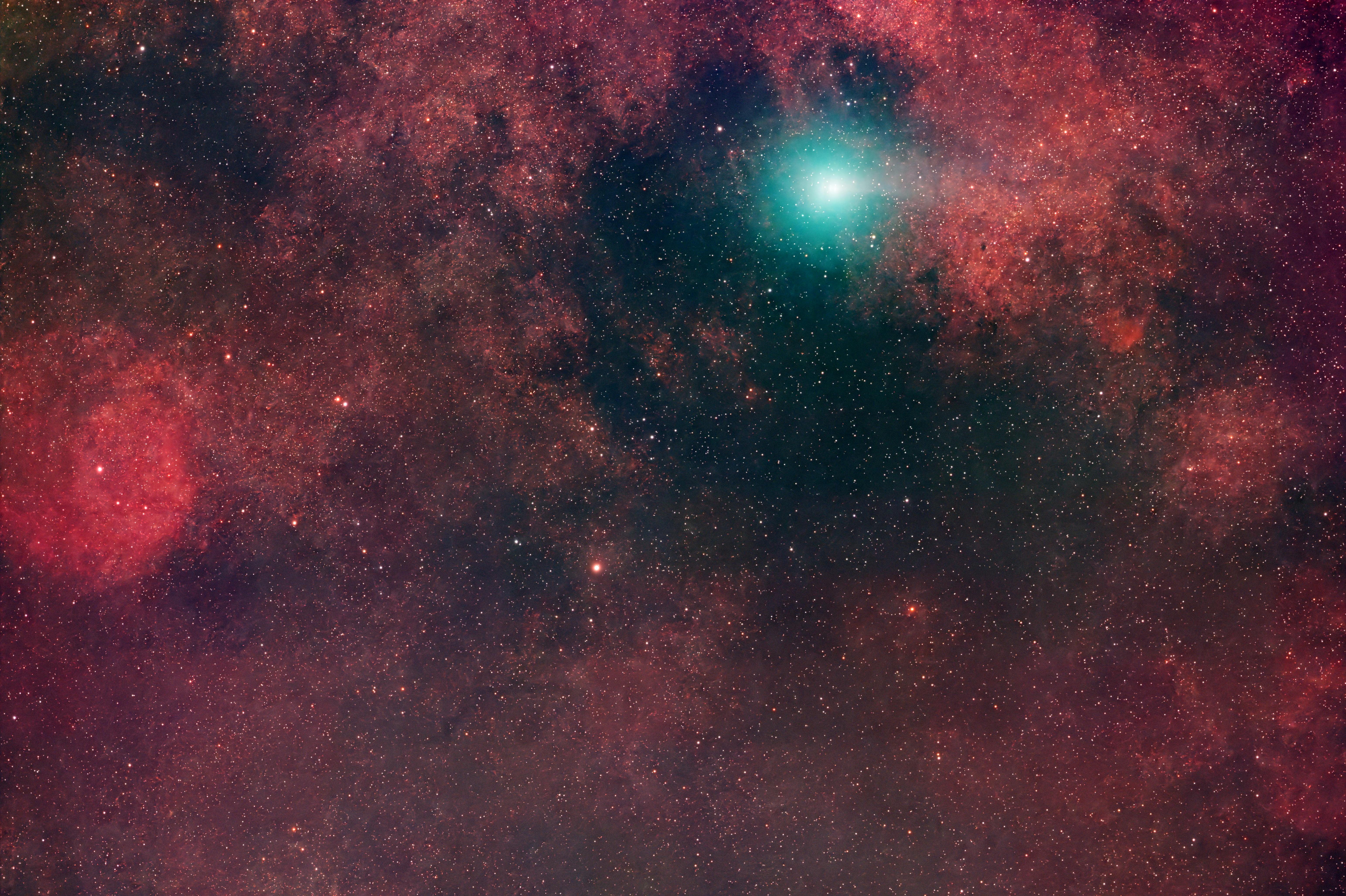 Vivid nebula and starfield captured in the night sky, showcasing cosmic beauty.