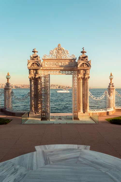 Free Elegant gate with intricate design, facing the Bosphorus Strait in Istanbul under a clear sky. Stock Photo