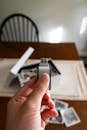 USB Drive and Vintage Photos on Table