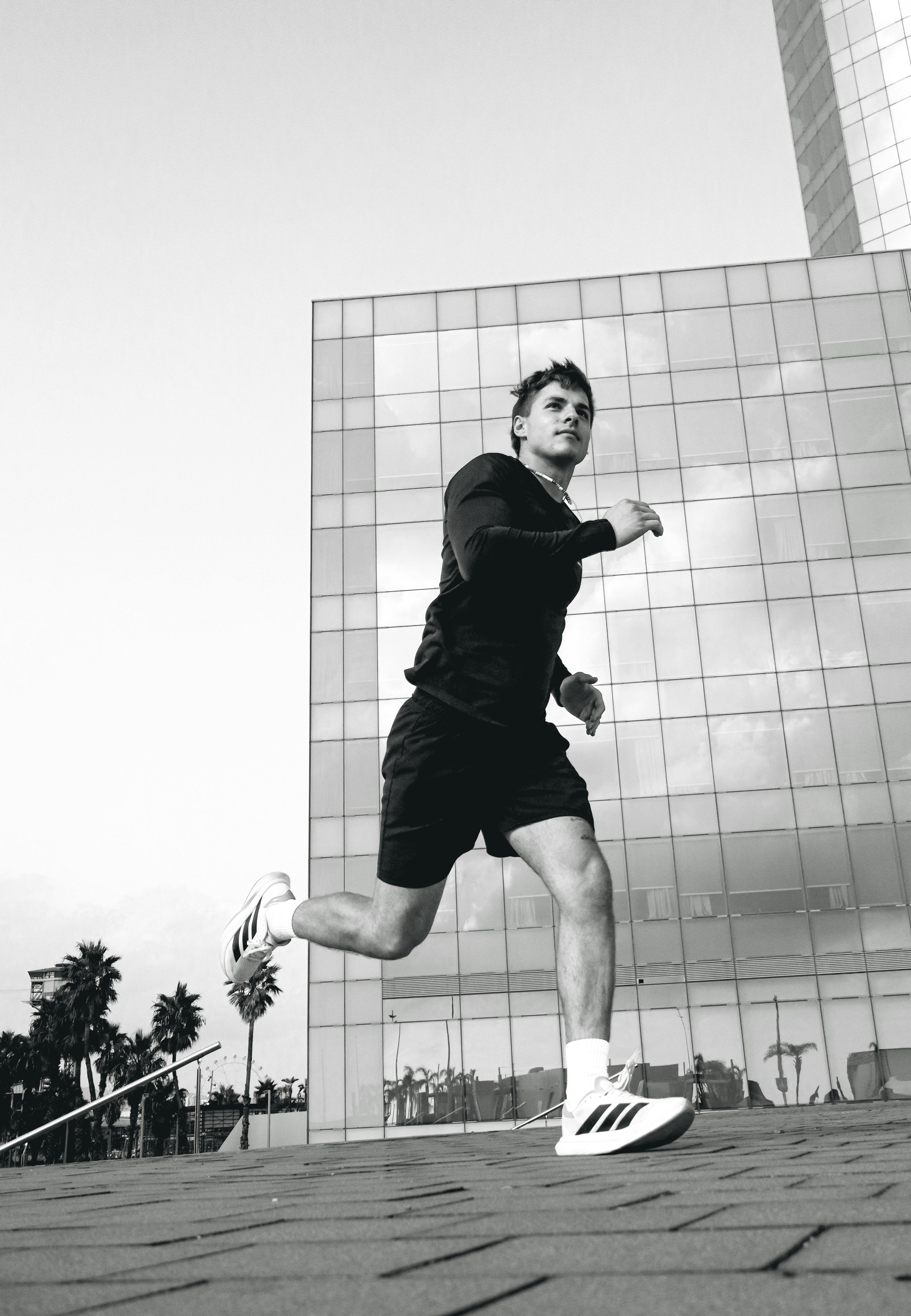 Group of runners exercising together in urban setting