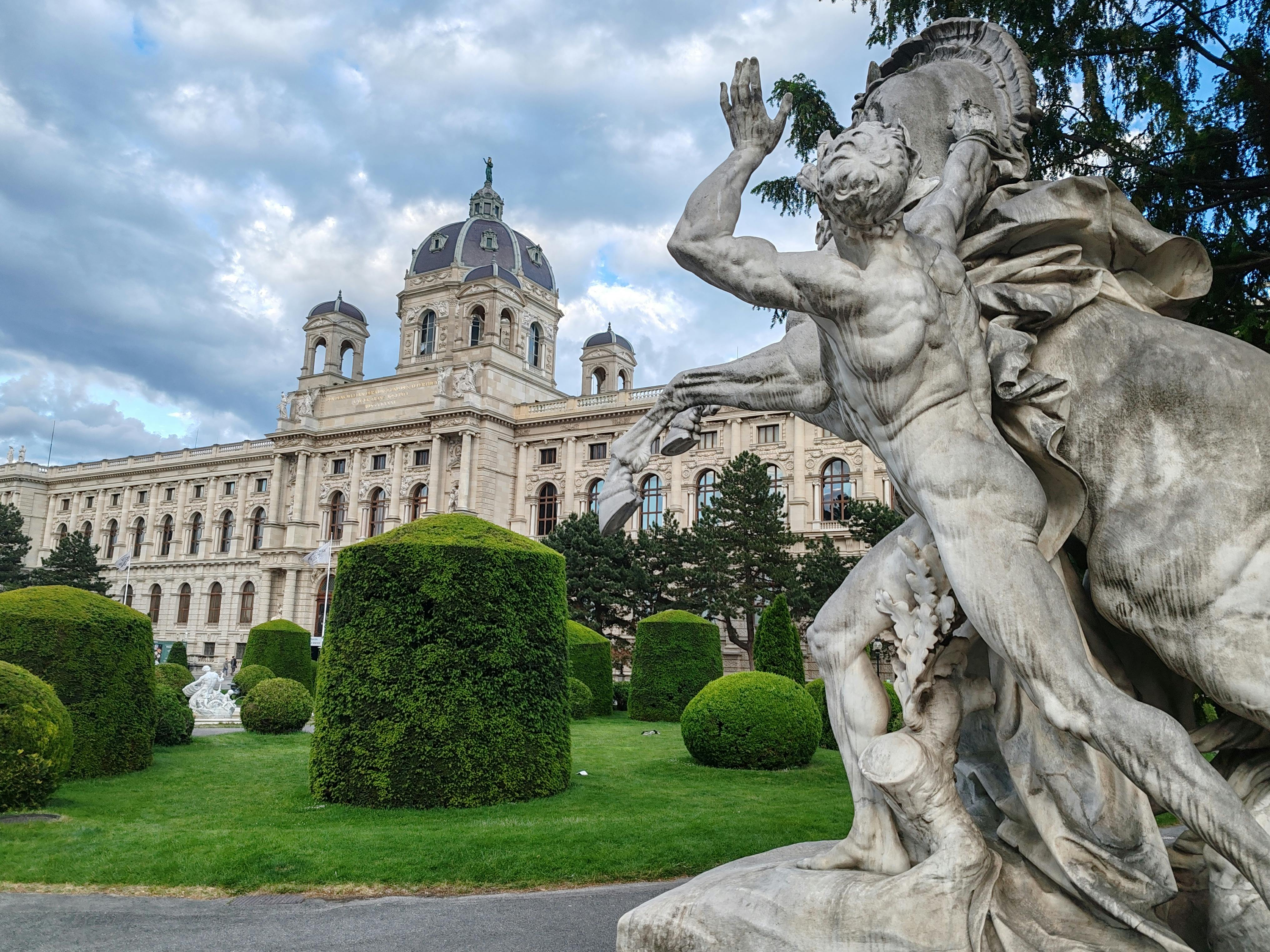 Classical sculpture in a garden setting near the Vienna Museum of Art History.