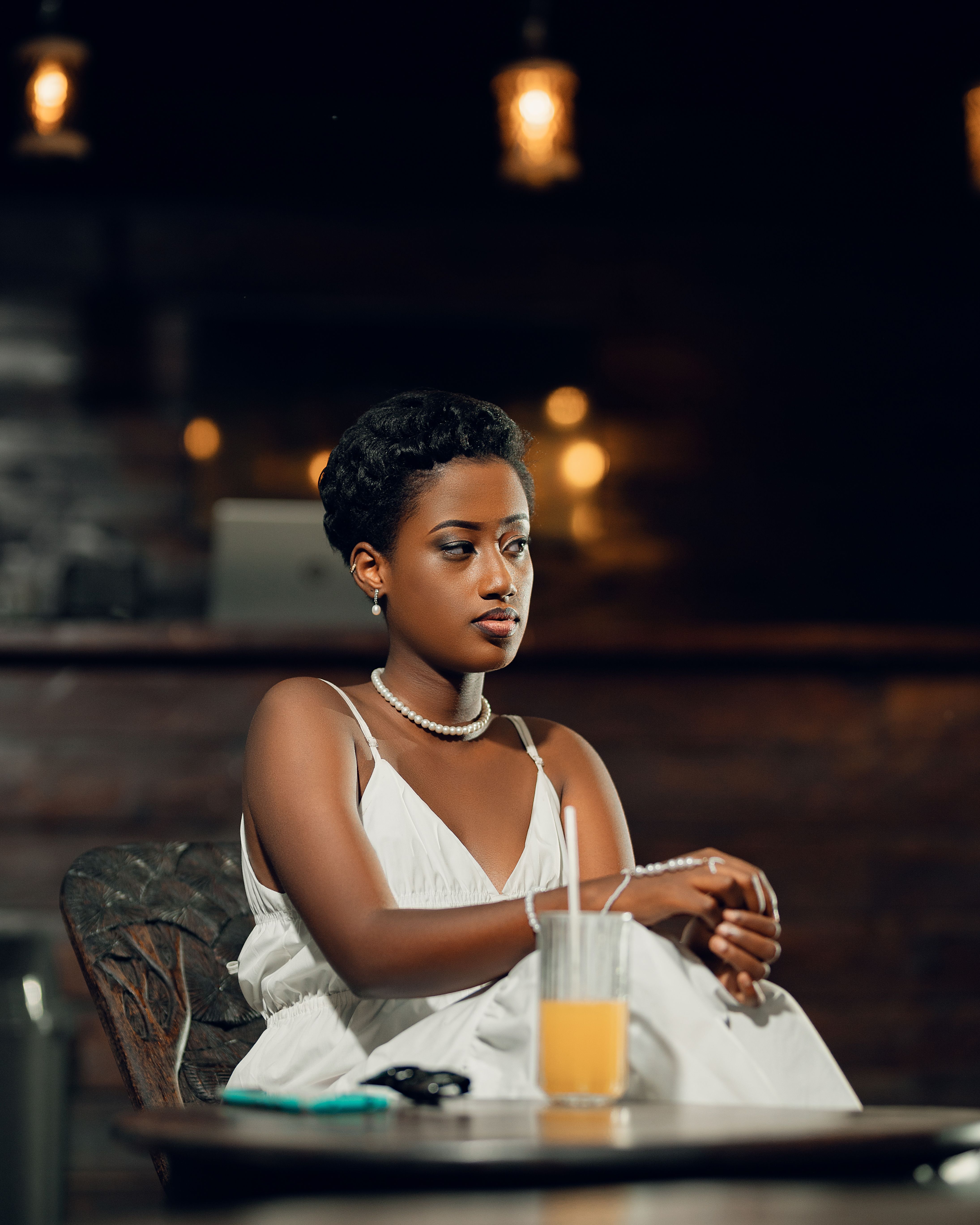 Photo Of Woman Lying On Table · Free Stock Photo