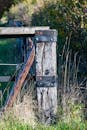 Rustic Wooden Fence Post in Countryside Setting