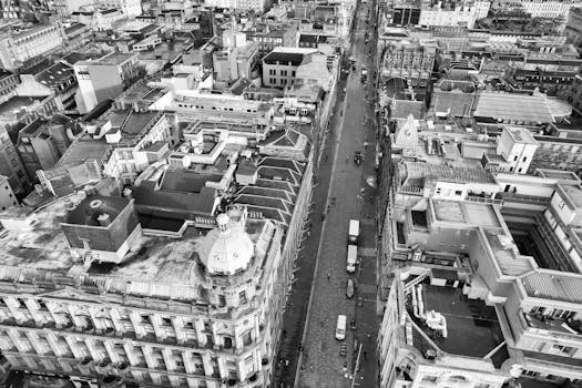 A stunning aerial black and white view of Glasgow's architectural landscape.