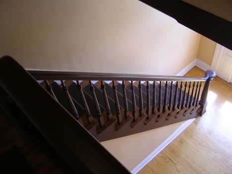 Brown Wooden Stairs in Front of White Wooden Door