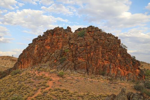 Free Explore the dramatic rock formations of Australia's Northern Territory under a vibrant sky. Stock Photo