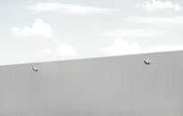 Minimalist Industrial Building Against Blue Sky