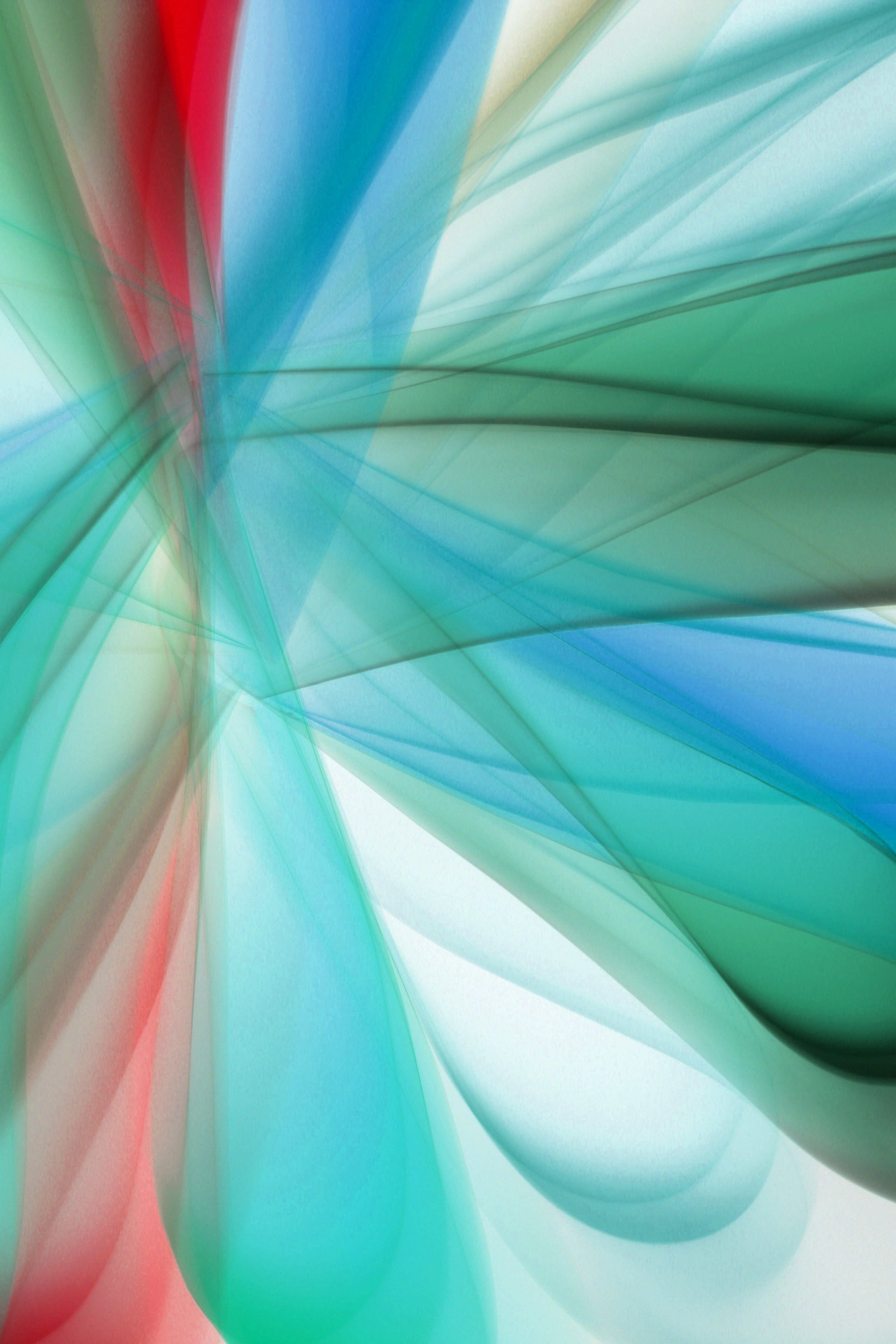 Vivid abstract art featuring colorful light patterns in a harmonious, flowing design.
