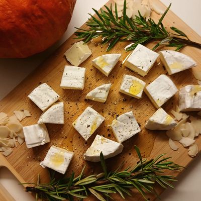 Rustic cheese platter with rosemary, photo by The_a DoTe on Pexels