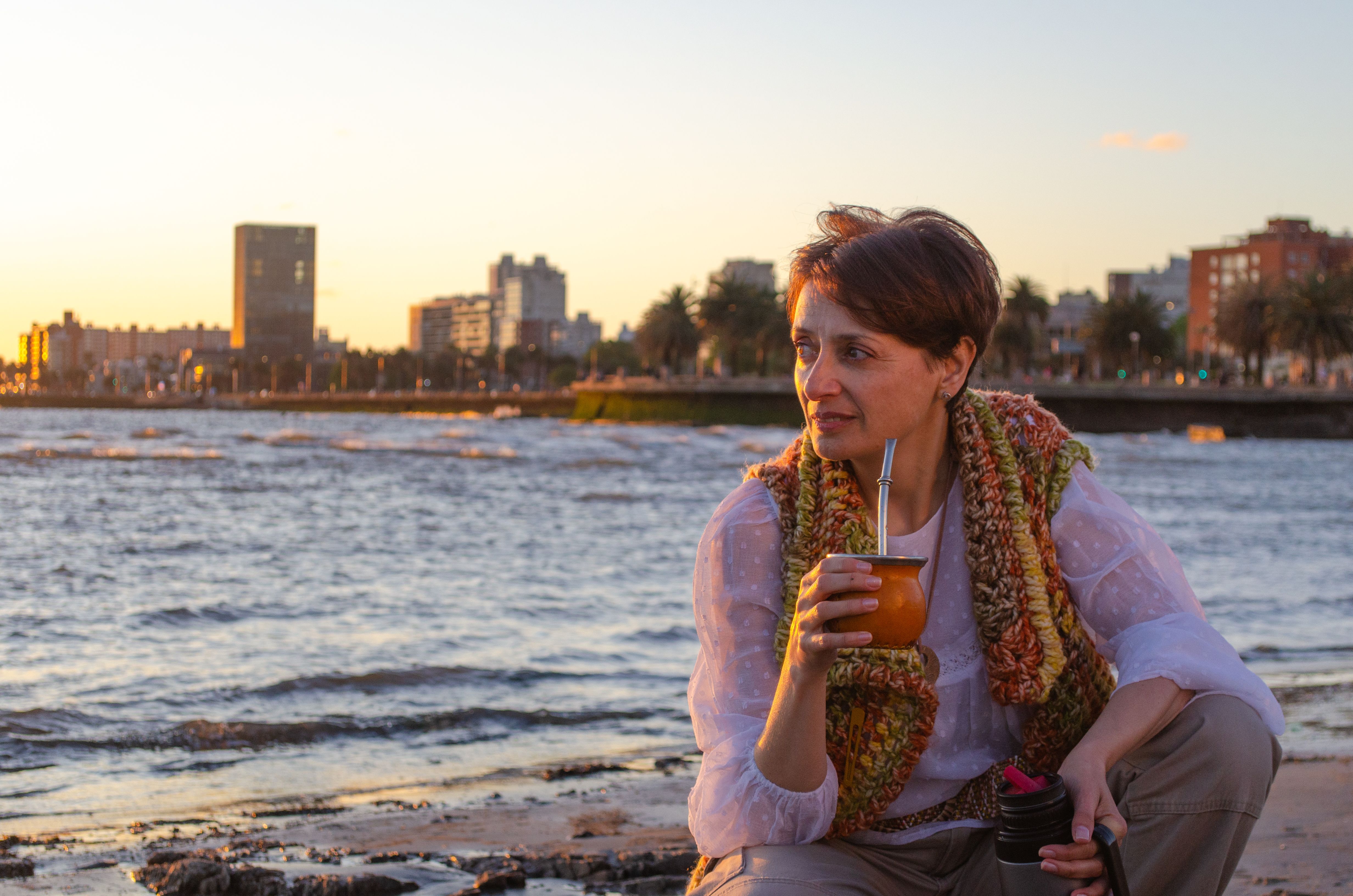 Relaxing by the Montevideo waterfront with mate in hand, this serene moment captures the essence of Uruguayan culture.