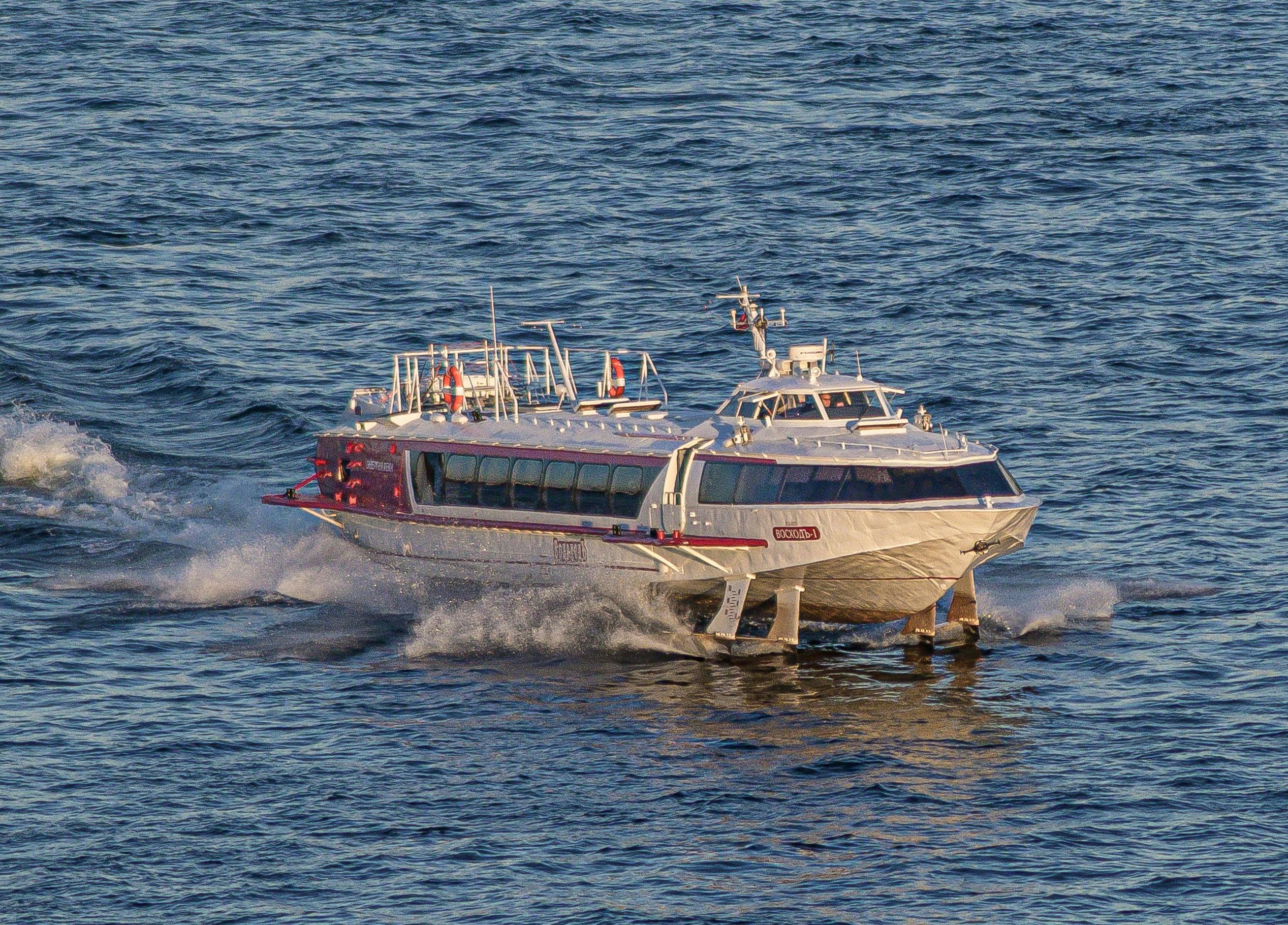 High-speed catamaran ferry on calm waters making the crossing between Singapore and Bintan Island