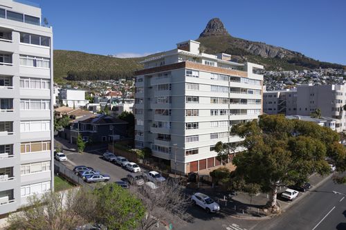Free Aerial view of Cape Town's cityscape featuring Lion's Head and modern buildings. Stock Photo
