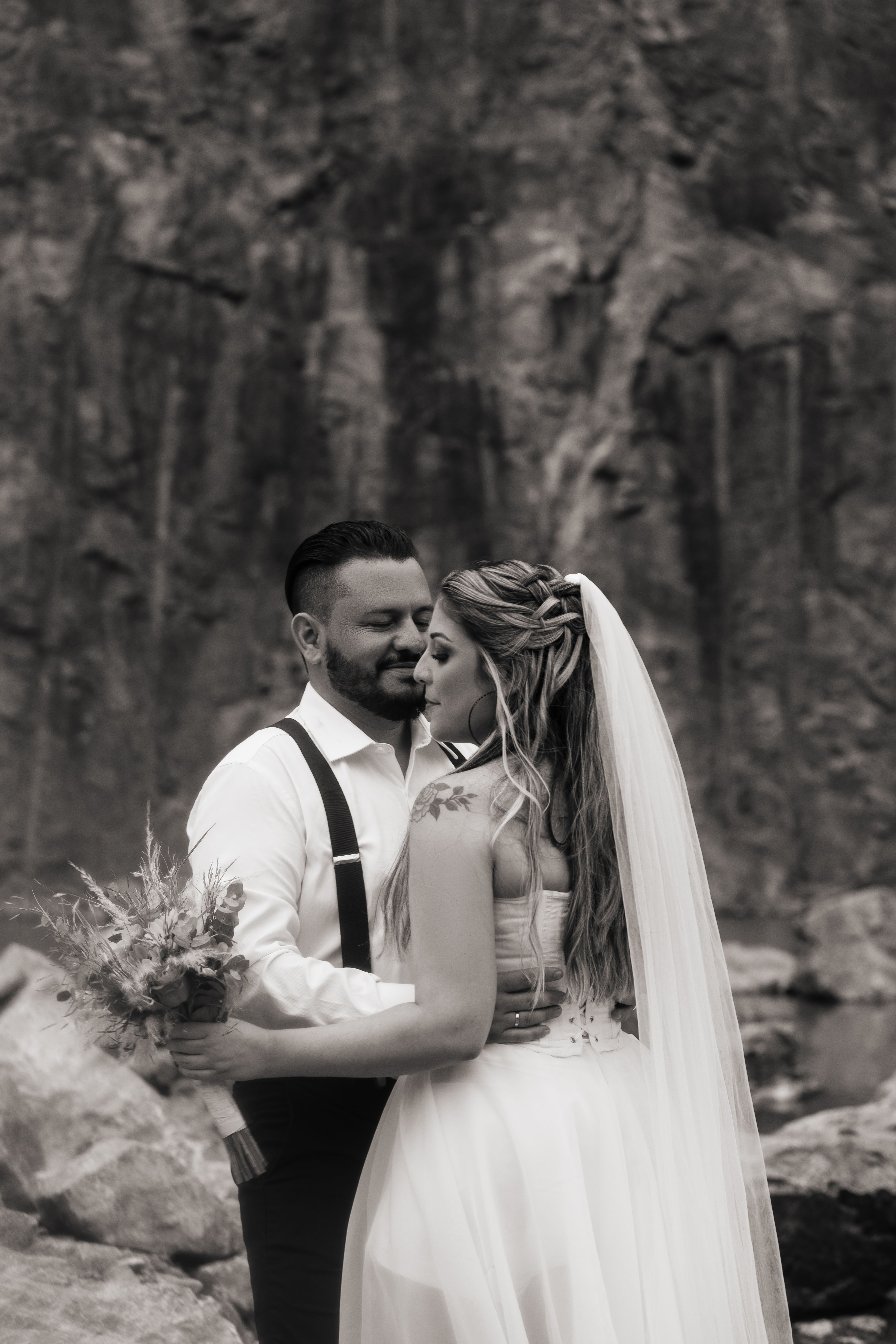 Romantic Wedding Couple Embrace Outdoors · Free Stock Photo