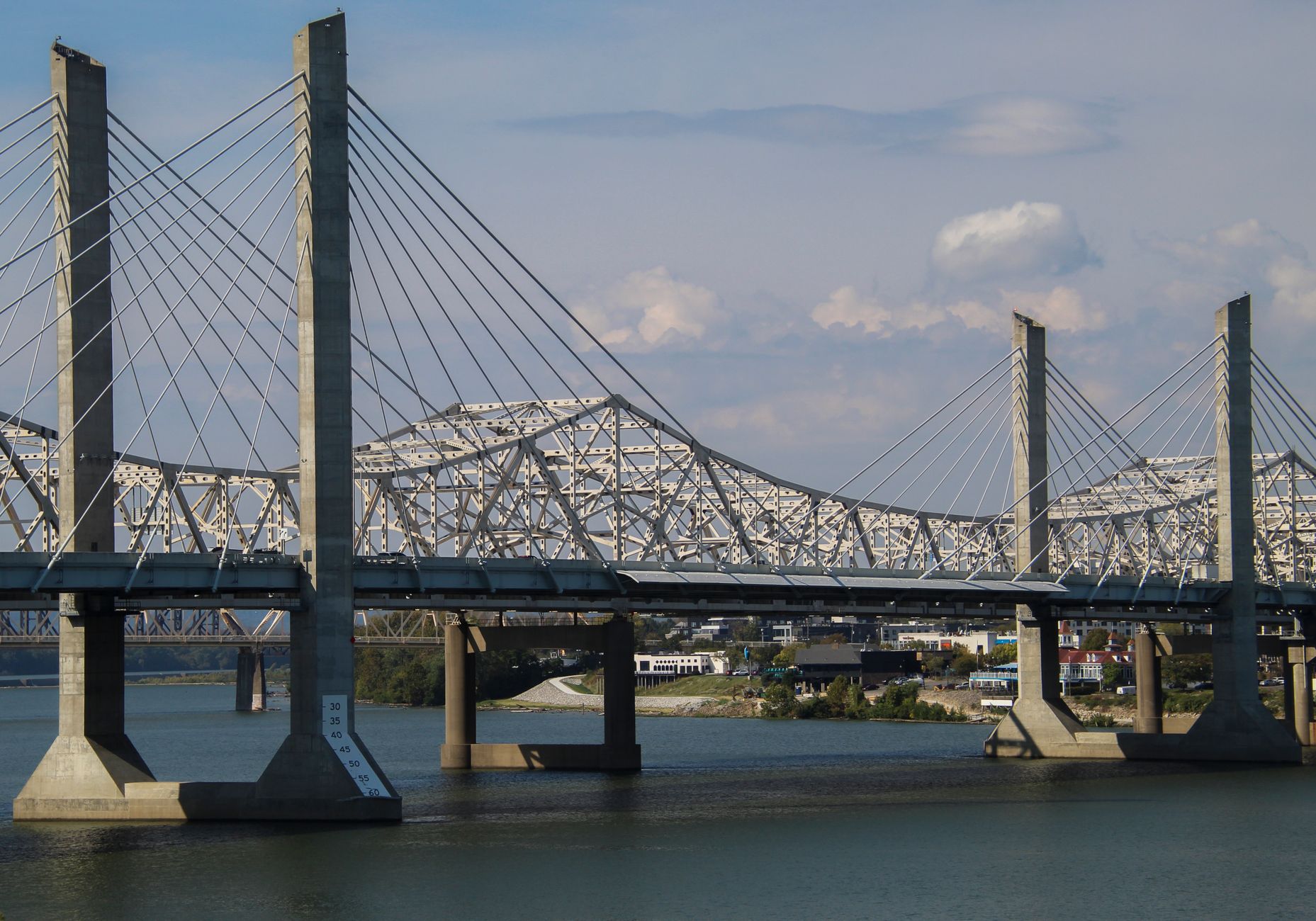 View of the cable-stayed bridge spanning the river, Louisville skyline in the background.