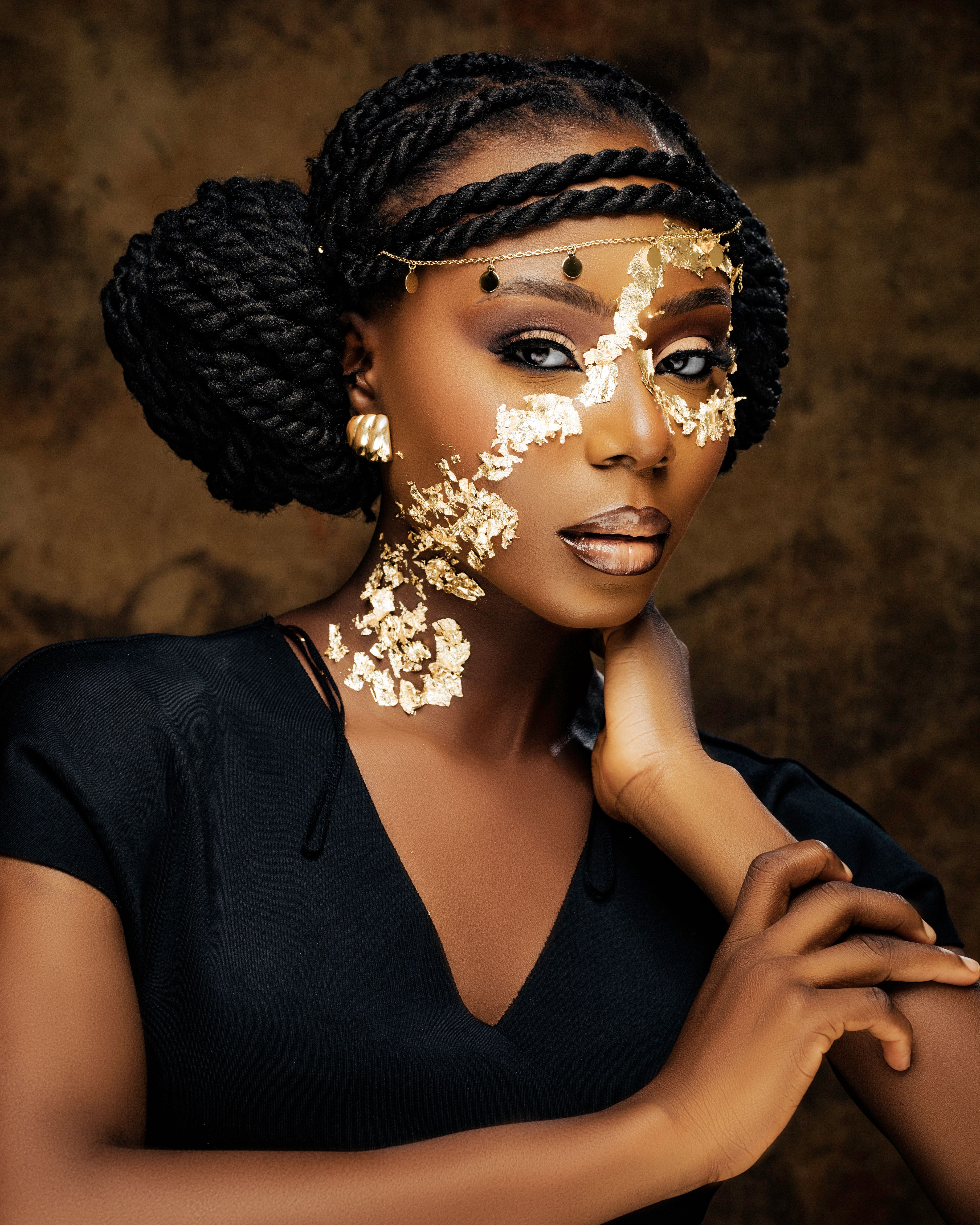 Elegant Portrait with Gold Leaf and Braided Hairstyle · Free Stock Photo