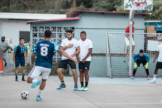 Dynamic capture of a soccer game with players in motion, showcasing teamwork and strategy.