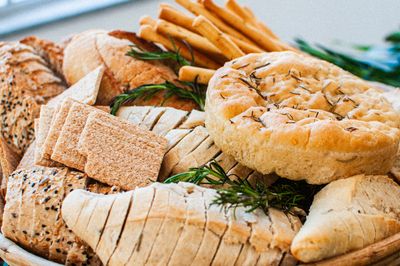 Bread selection with rosemary, photo by Ta&iacute;s Alves on Pexels